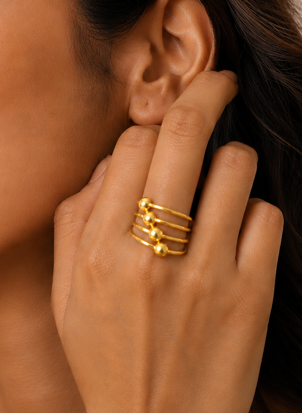 The Quartet Orbit Ring