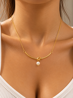 Gold Knot Pearl Necklace
